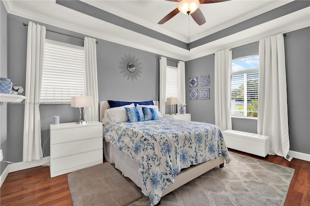 20656 SW 89th Ave, Cutler Bay, FL 33189 - bedroom with wood finished floors, baseboards, a ceiling fan, crown molding, and a tray ceiling