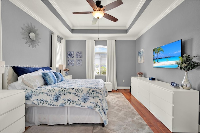 20656 SW 89th Ave, Cutler Bay, FL 33189 - bedroom featuring a raised ceiling, ceiling fan, ornamental molding, and wood finished floors