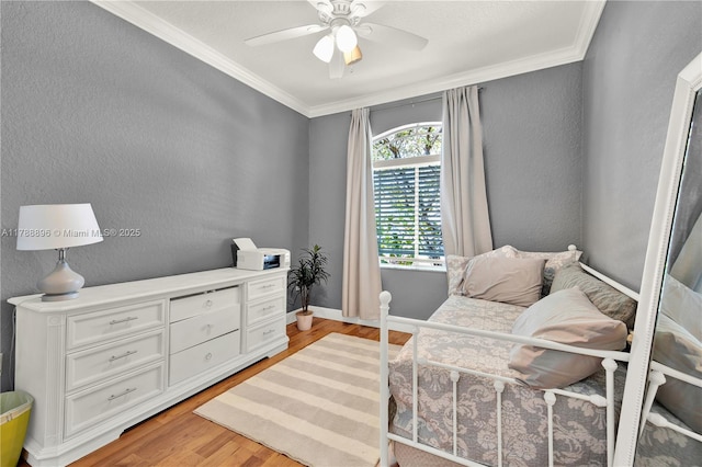 20656 SW 89th Ave, Cutler Bay, FL 33189 - living area with light wood-style floors, a textured wall, baseboards, ornamental molding, and a ceiling fan