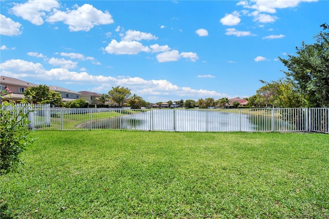 20656 SW 89th Ave, Cutler Bay, FL 33189 - view of yard featuring a residential view, a water view, and fence