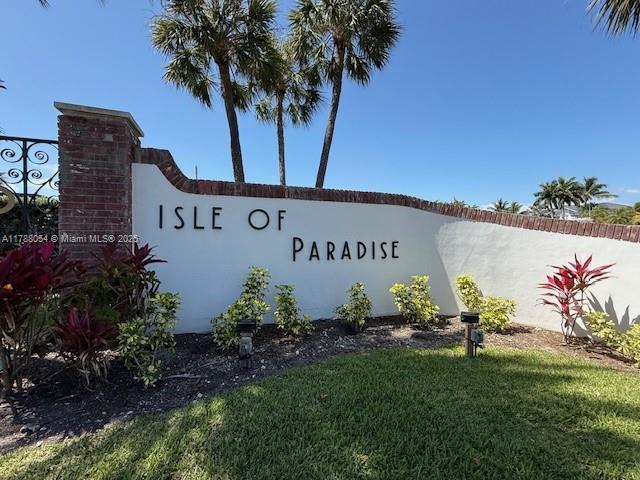450 E Paradise Isle Blvd Unit 208, Hallandale Beach, FL 33009 - community / neighborhood sign with a yard