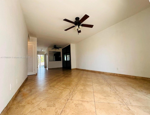 450 E Paradise Isle Blvd Unit 208, Hallandale Beach, FL 33009 - unfurnished living room with a ceiling fan and baseboards