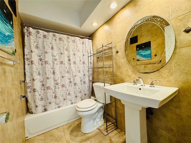 450 E Paradise Isle Blvd Unit 208, Hallandale Beach, FL 33009 - full bathroom with tile walls, tile patterned flooring, shower / bath combination with curtain, and recessed lighting