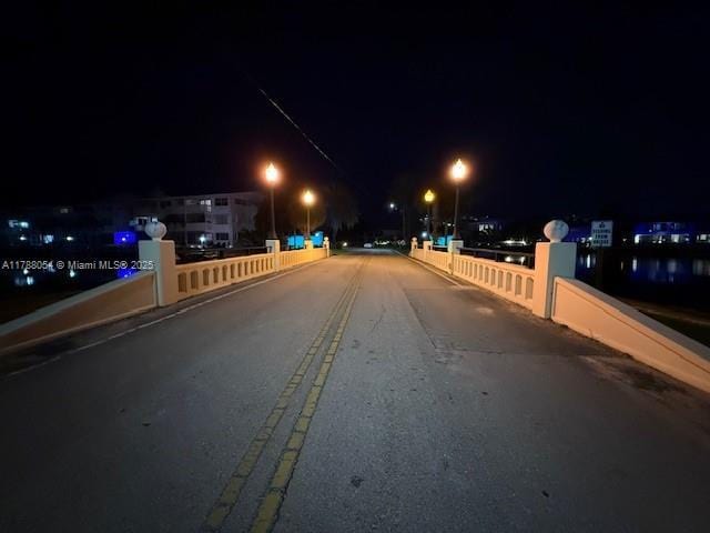 450 E Paradise Isle Blvd Unit 208, Hallandale Beach, FL 33009 - view of asphalt street featuring street lighting