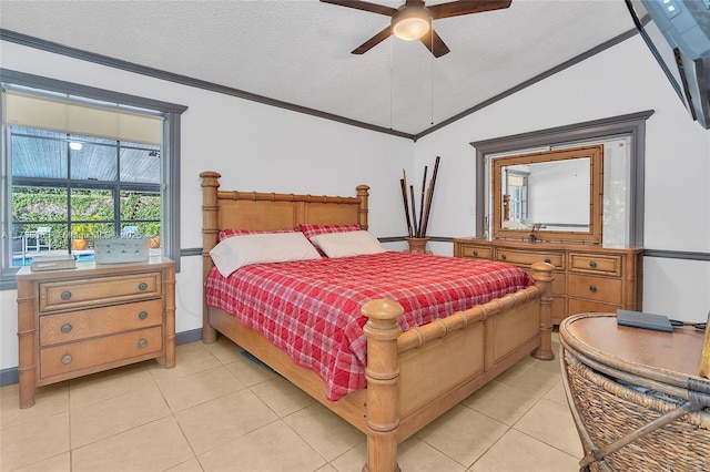bedroom with a textured ceiling, crown molding, and light tile patterned floors