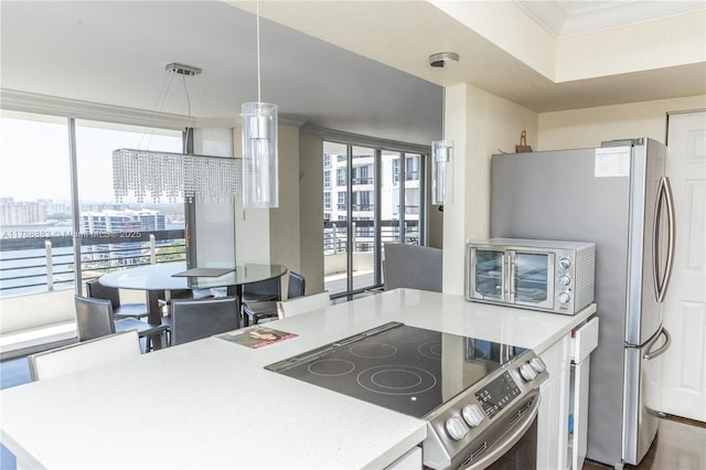 3530 Mystic Pointe Dr Unit 2910, Aventura, FL 33180 - kitchen featuring a toaster, ornamental molding, a view of city, light countertops, and electric range