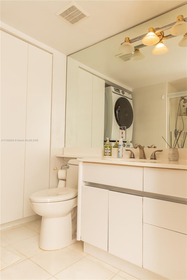 3530 Mystic Pointe Dr Unit 2910, Aventura, FL 33180 - bathroom featuring toilet, a stall shower, visible vents, tile patterned flooring, and vanity