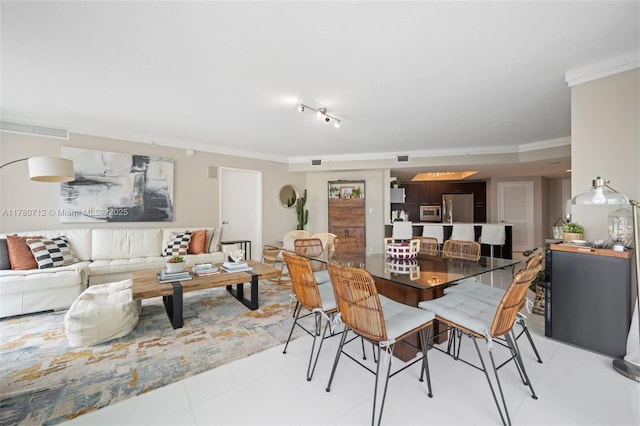 250 Sunny Isles Blvd Unit 3-1505, Sunny Isles Beach, FL 33160 - dining room with crown molding and light tile patterned floors
