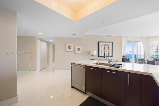 250 Sunny Isles Blvd Unit 3-1505, Sunny Isles Beach, FL 33160 - kitchen with stainless steel dishwasher, light countertops, dark brown cabinets, light tile patterned floors, and recessed lighting