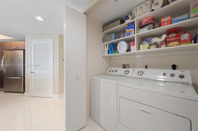 250 Sunny Isles Blvd Unit 3-1505, Sunny Isles Beach, FL 33160 - laundry room with washing machine and dryer and light tile patterned floors