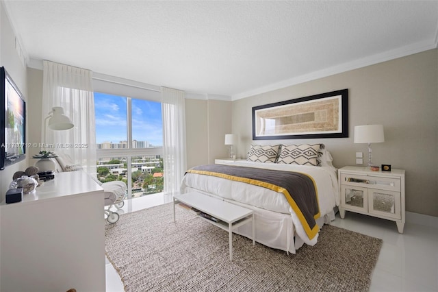 250 Sunny Isles Blvd Unit 3-1505, Sunny Isles Beach, FL 33160 - bedroom featuring crown molding, a textured ceiling, and a city view