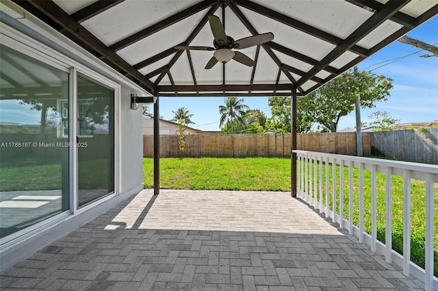 view of patio with a gazebo, a ceiling fan, and a fenced backyard