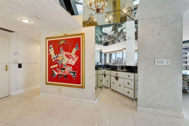 3000 Island Blvd Unit 706, Aventura, FL 33160 - hall featuring light tile patterned floors and a sink