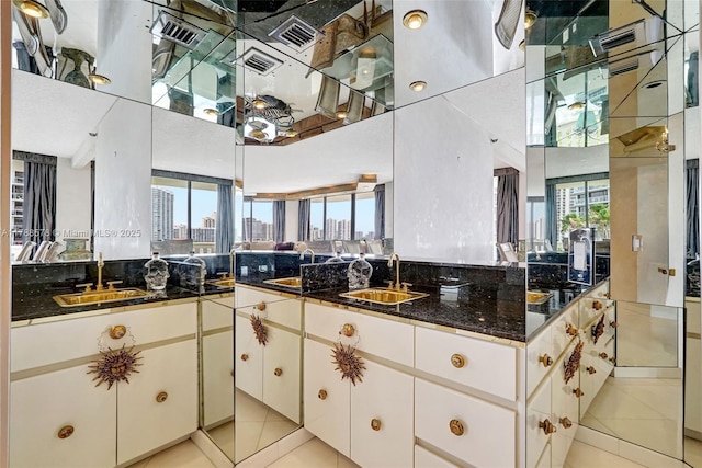 3000 Island Blvd Unit 706, Aventura, FL 33160 - bathroom featuring tile patterned flooring, a city view, and vanity