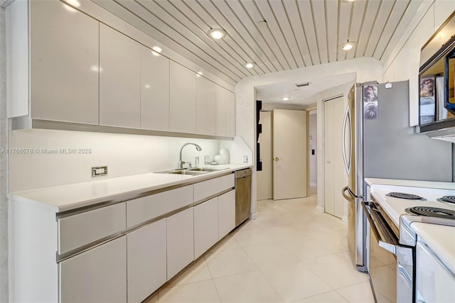 3000 Island Blvd Unit 706, Aventura, FL 33160 - kitchen featuring stainless steel dishwasher, light countertops, a sink, white range with electric stovetop, and recessed lighting
