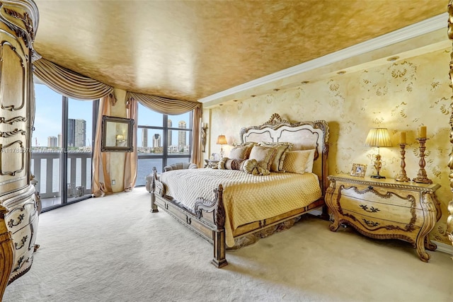 3000 Island Blvd Unit 706, Aventura, FL 33160 - carpeted bedroom featuring access to exterior, a water view, ornamental molding, and a view of city