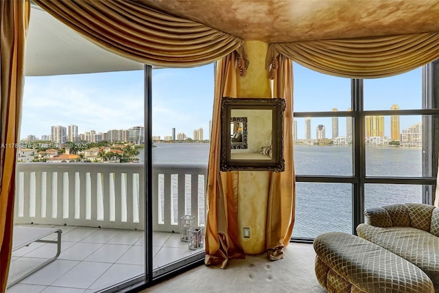 3000 Island Blvd Unit 706, Aventura, FL 33160 - sunroom with a view of skyline, plenty of natural light, and a water view