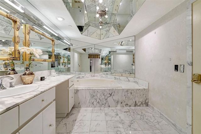 3000 Island Blvd Unit 706, Aventura, FL 33160 - full bathroom featuring a garden tub, double vanity, baseboards, and marble finish flooring