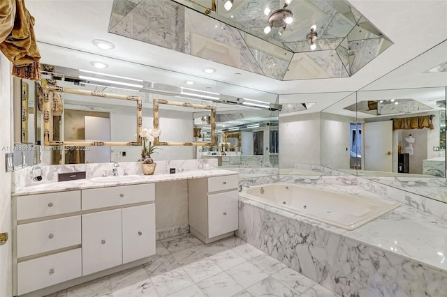3000 Island Blvd Unit 706, Aventura, FL 33160 - bathroom with a whirlpool tub, vanity, and marble finish flooring