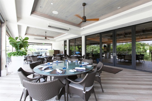 3000 Island Blvd Unit 706, Aventura, FL 33160 - dining space with ceiling fan, a raised ceiling, and light wood-style floors