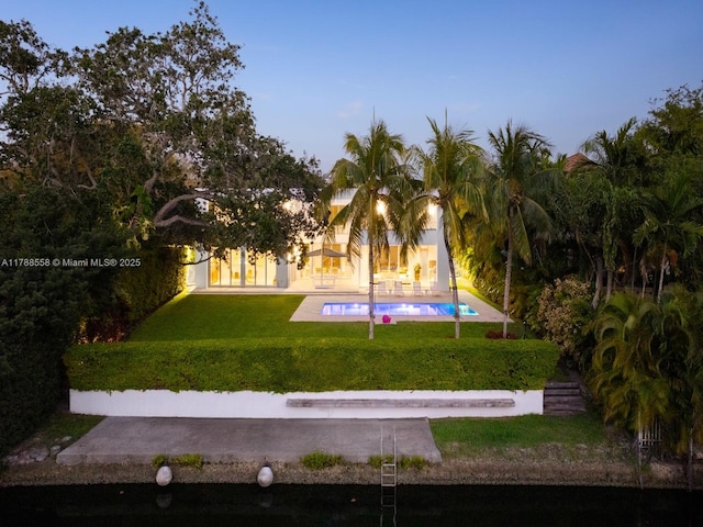 exterior space featuring a lawn