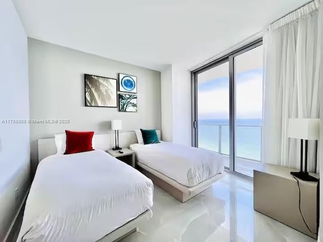 4111 S Ocean Dr Unit 1801, Hollywood, FL 33019 - bedroom with a water view, access to outside, floor to ceiling windows, and finished concrete floors