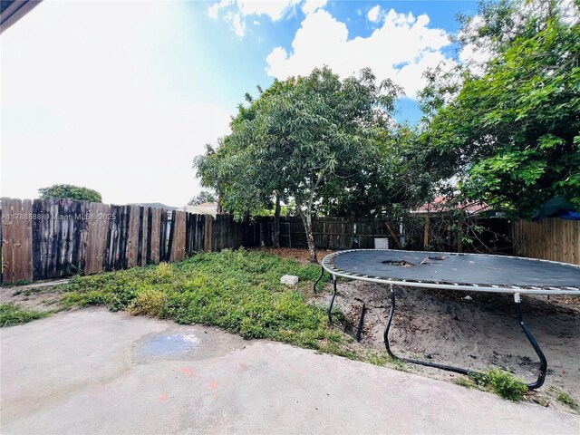 3530 NW 194th Ter, Miami Gardens, FL 33056 - view of yard featuring a patio and a fenced backyard