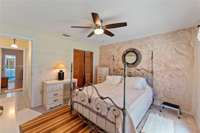 11421 NW 37th Pl, Sunrise, FL 33323 - bedroom with a closet, ceiling fan, and baseboards