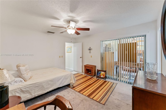 11421 NW 37th Pl, Sunrise, FL 33323 - bedroom featuring carpet, a textured ceiling, and a ceiling fan