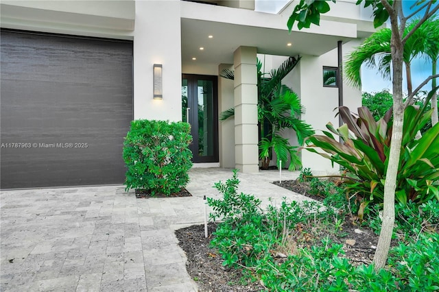 1733 NE 16th Ter, Fort Lauderdale, FL 33305 - doorway to property with stucco siding