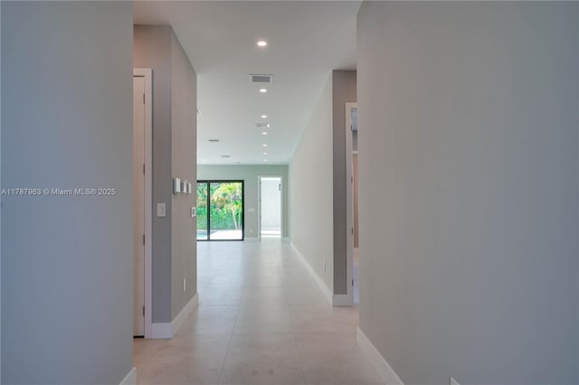 1733 NE 16th Ter, Fort Lauderdale, FL 33305 - hallway with baseboards, light tile patterned flooring, visible vents, and recessed lighting