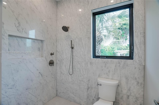 1733 NE 16th Ter, Fort Lauderdale, FL 33305 - full bathroom featuring tile walls, a marble finish shower, a wealth of natural light, and toilet