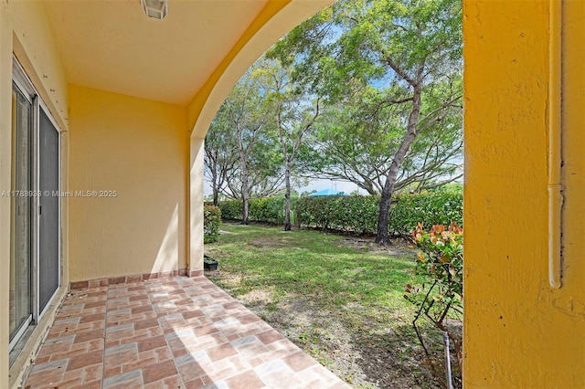 8308 Santa Monica Ave, Tamarac, FL 33321 - view of green lawn with a patio