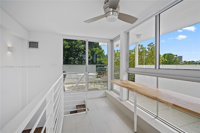 1600 Michigan Ave Unit 7, Miami Beach, FL 33139 - unfurnished sunroom with healthy amount of natural light and a ceiling fan