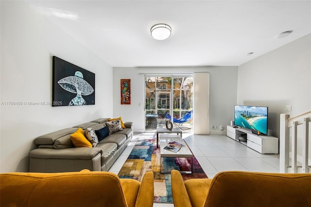 living room with tile patterned floors