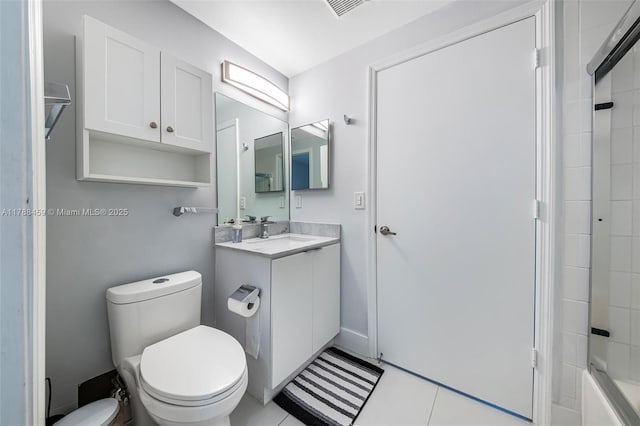 bathroom featuring visible vents, tile patterned floors, vanity, and toilet