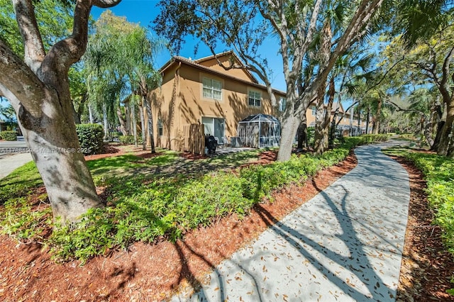 view of home's exterior with stucco siding