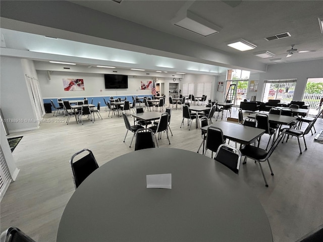 7911 W Exeter Blvd W Unit A101, Tamarac, FL 33321 - dining space featuring light wood-type flooring