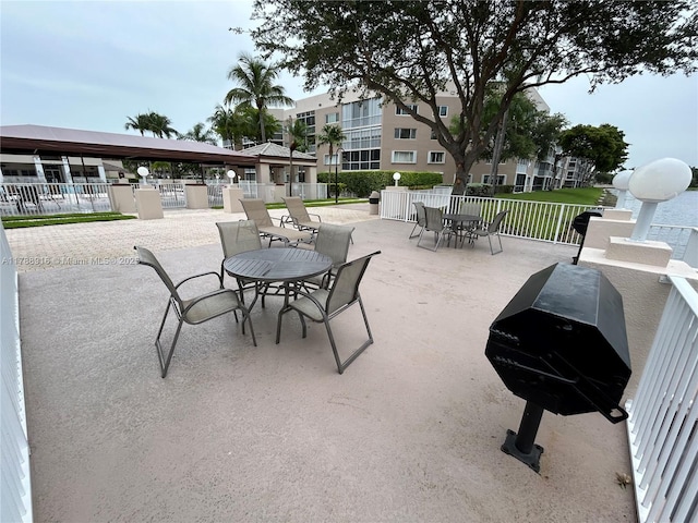 7911 W Exeter Blvd W Unit A101, Tamarac, FL 33321 - view of patio with a grill