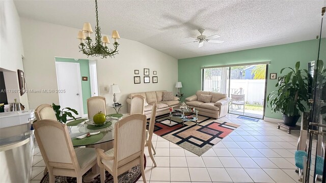 11657 NW 11th St, Pembroke Pines, FL 33026 - dining space with a ceiling fan, lofted ceiling, a chandelier, light tile patterned flooring, and a textured ceiling