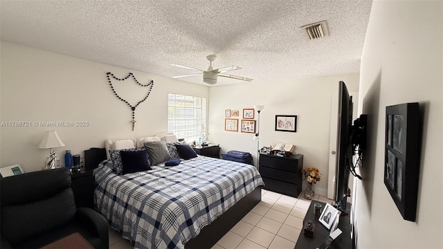 11657 NW 11th St, Pembroke Pines, FL 33026 - bedroom with light tile patterned flooring, ceiling fan, and a textured ceiling