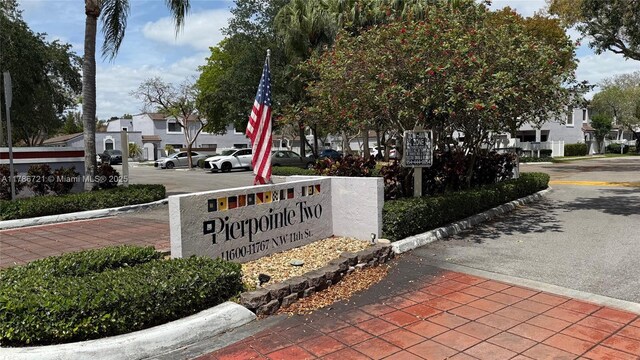 11657 NW 11th St, Pembroke Pines, FL 33026 - community / neighborhood sign with a residential view