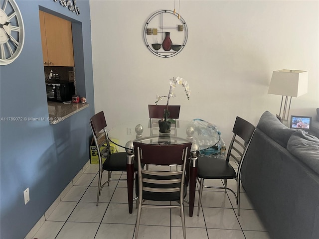 10851 SW 2nd St Unit K304, Sweetwater, FL 33174 - dining space with light tile patterned flooring