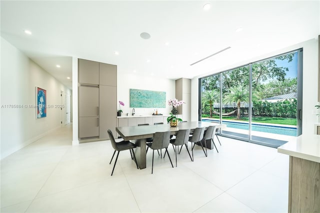 dining space with recessed lighting