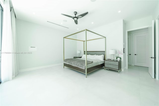 bedroom with a ceiling fan, recessed lighting, and concrete floors