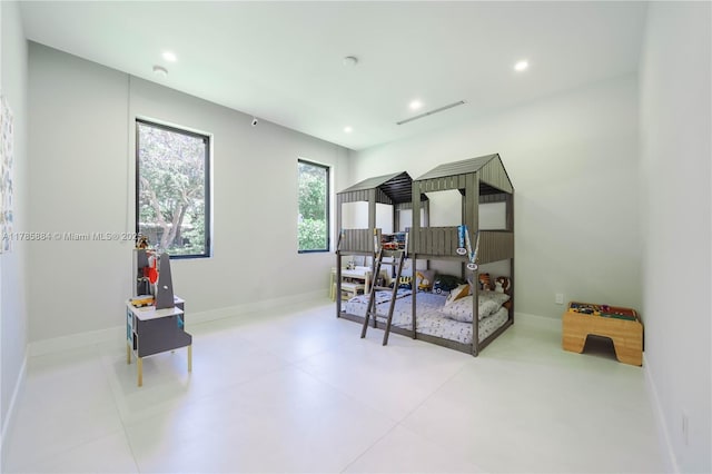 bedroom featuring recessed lighting and baseboards