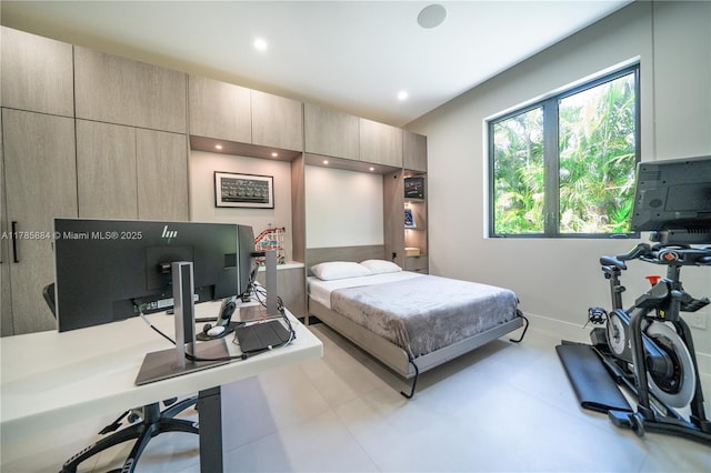 bedroom featuring baseboards