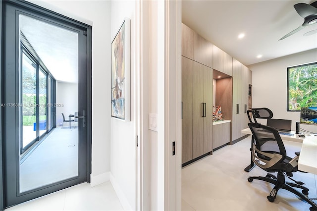 home office with recessed lighting and baseboards