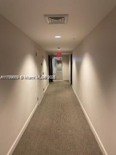 1861 NW S River Dr Unit 1602, Miami, FL 33125 - hall featuring baseboards and carpet