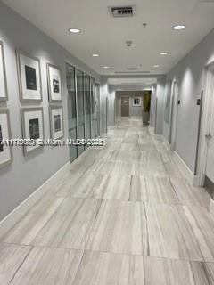 1861 NW S River Dr Unit 1602, Miami, FL 33125 - hall with baseboards and recessed lighting